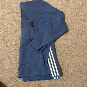 Adidas hoodie with front pocketed and not elastic band on the bottom.